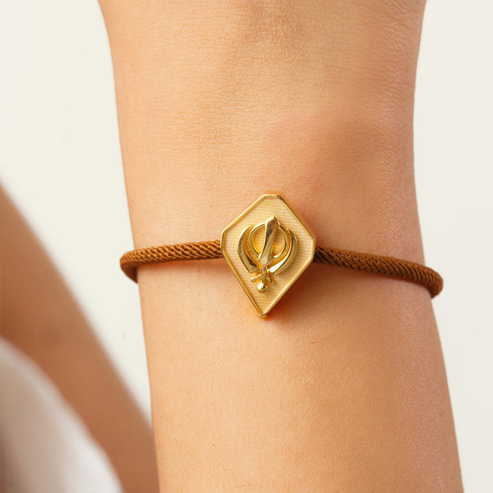 Gold Khanda Rakhi Bracelet