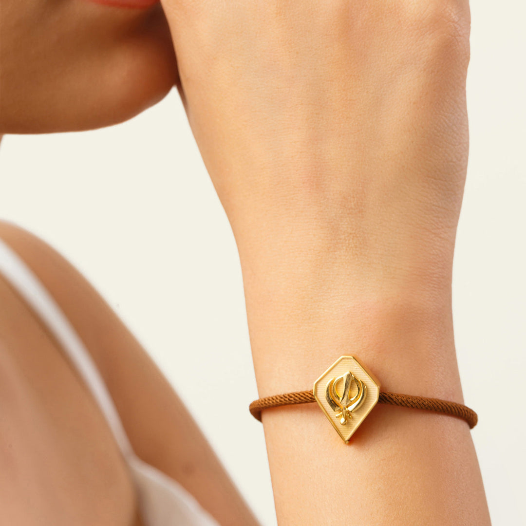 Gold Khanda Rakhi Bracelet
