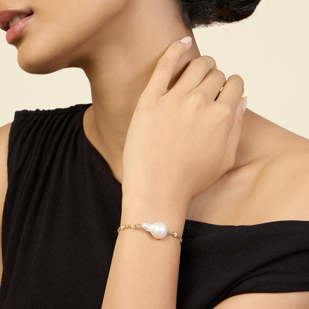 Gold Bracelet Wristwear for Women by Isharya | Modern Indian Jewellery