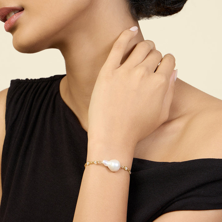 Gold Bracelet Wristwear for Women by Isharya | Modern Indian Jewellery