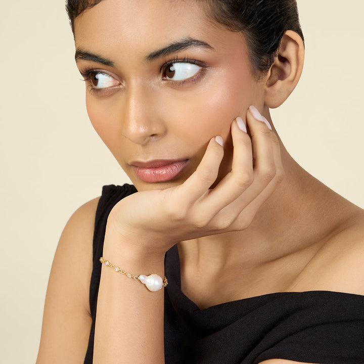 Gold Bracelet Wristwear for Women by Isharya | Modern Indian Jewellery