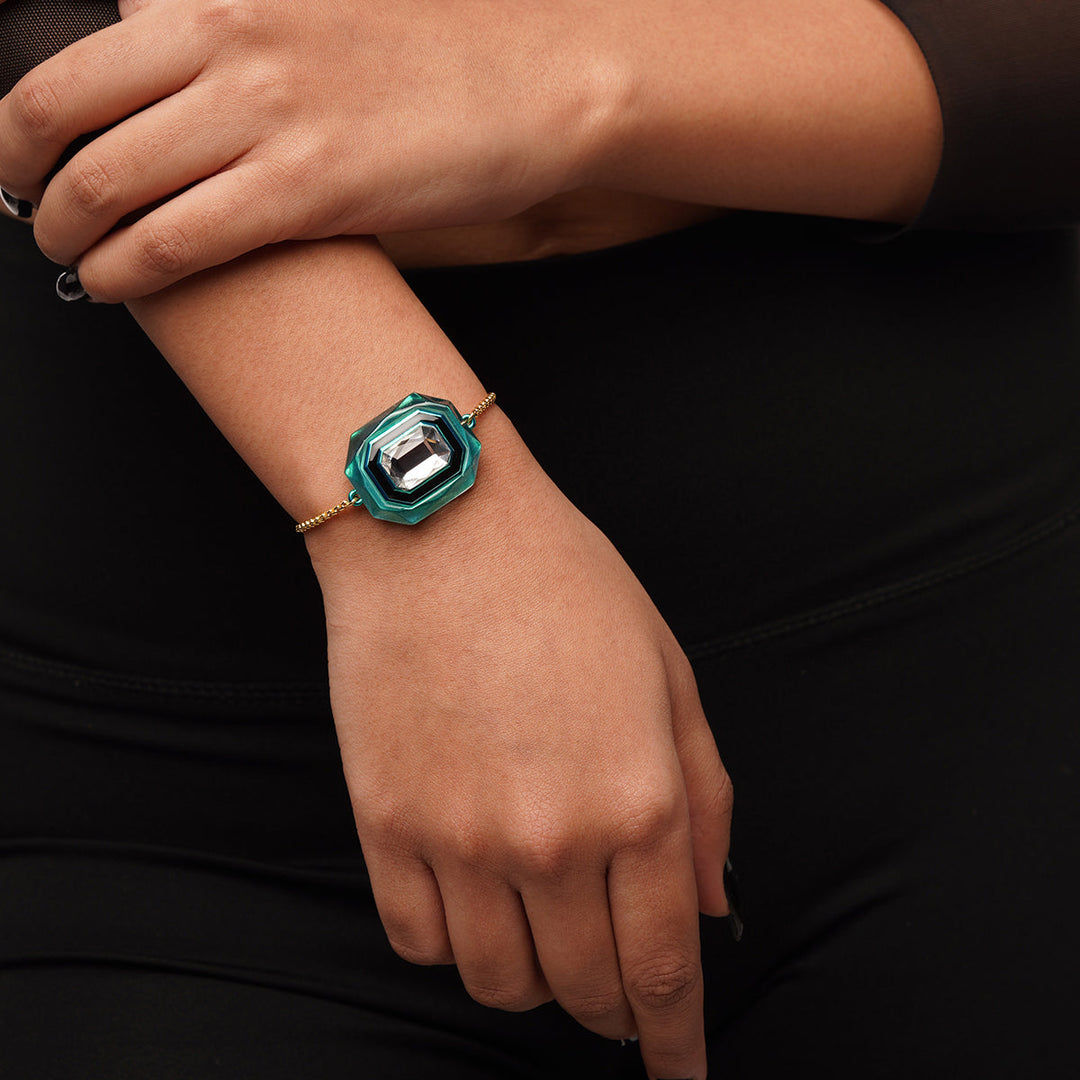 B-dazzle Green Crystal Infinity Cut Bracelet - Isharya | Modern Indian Jewelry